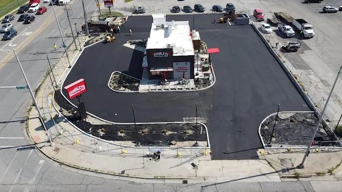 Aerial view of commercial asphalt paving project for restaurant parking lot